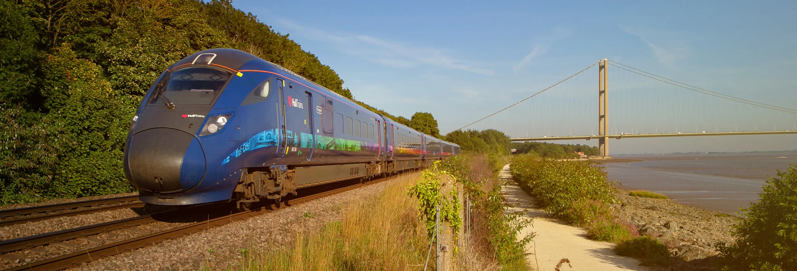 Hull Trains passing the Humber Bridge