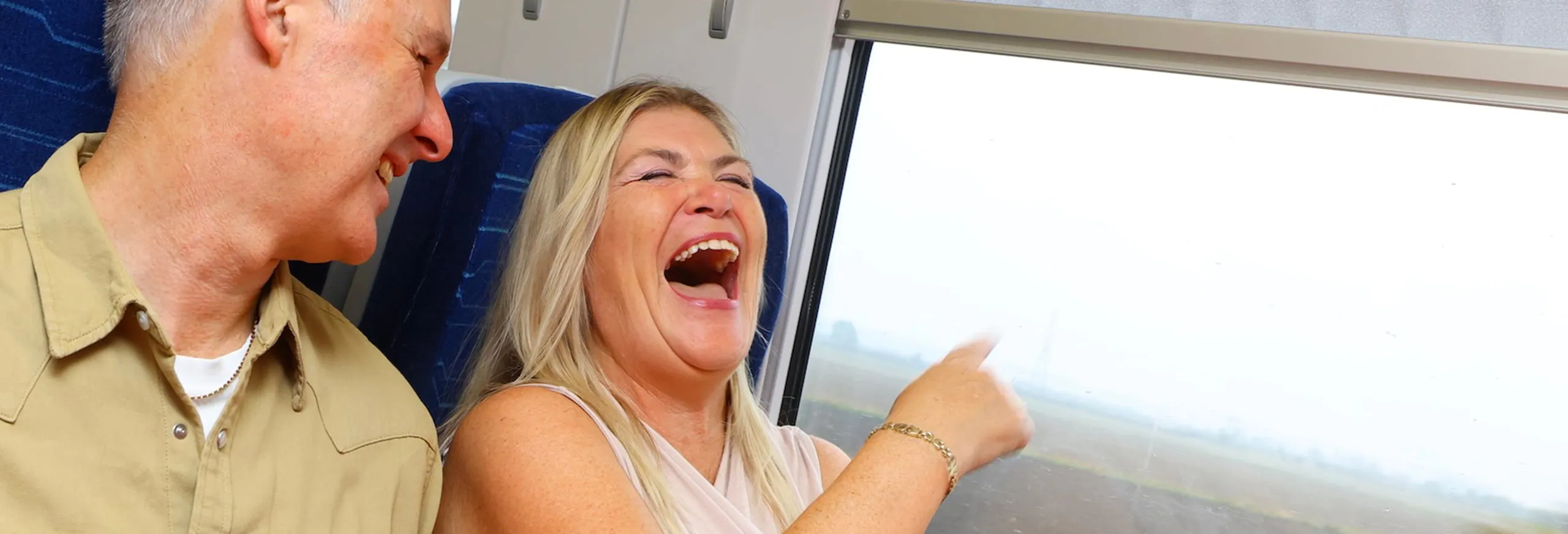 People laughing onboard a train