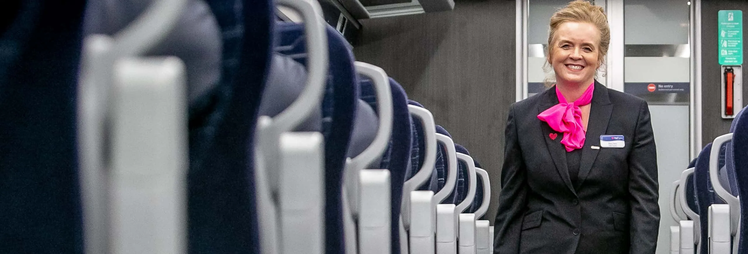 Hull Trains first class carriage interior and on board team member