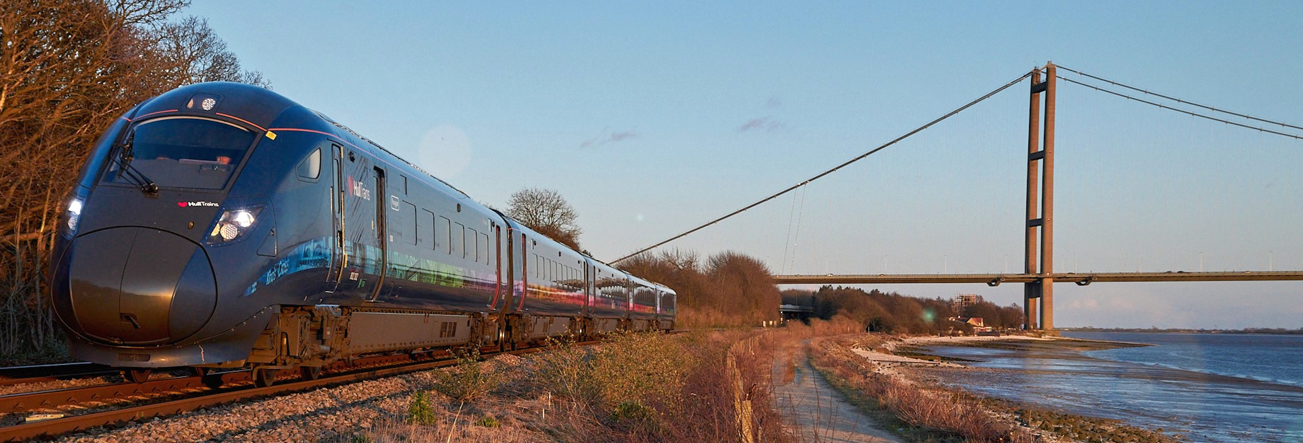 Hull Trains Paragon travelling by the Humber Bridge