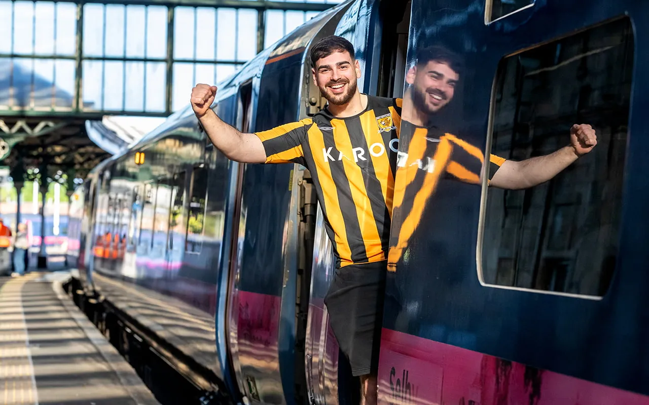 A Hull City fan on a Hull Trains service