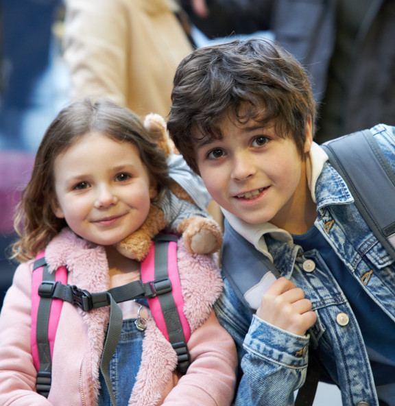 boy and girl outside train hull paragon station