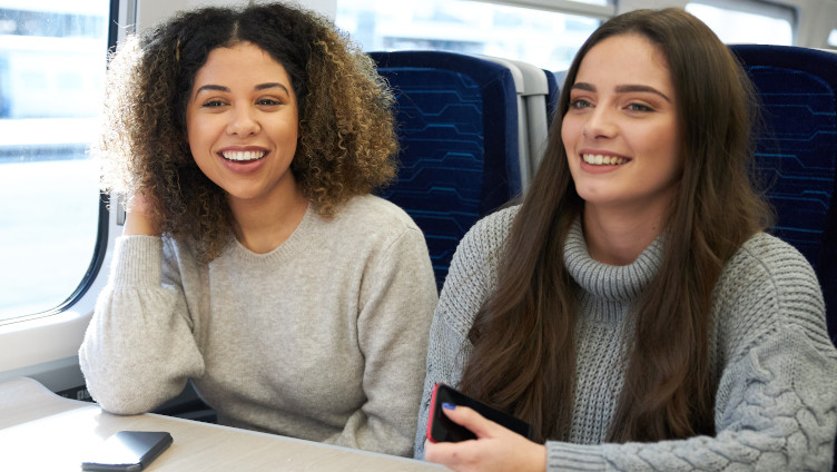 friends smiling together on board